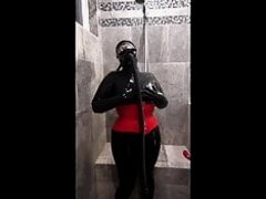 Latex rubber and gasmask in the shower with my new vibrator